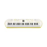 Teclado mini de 44 teclas Casio SA-80H2 con adaptador — vista completa sobre fondo blanco